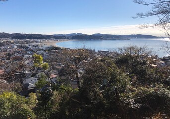 View over the city and coastline of Kamakura, Japan, on a sunny day