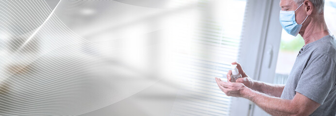 Man using hand sanitizer; prevention of virus and bacteria infection; panoramic banner