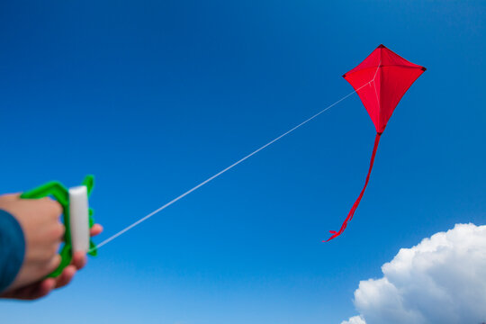 Flying a kite.