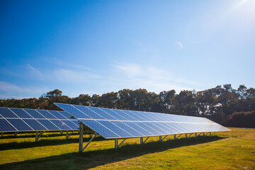 View of solar panels under blue sky