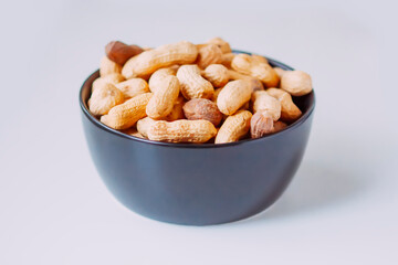 Unpeeled nuts close up. Peanuts.