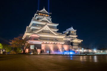 Beautiful Kumamoto Castle with star background after renovated in night light up event at  in Kyushu, Japan