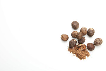 Obraz premium Concept of spices and condiments, nutmegs, space for text