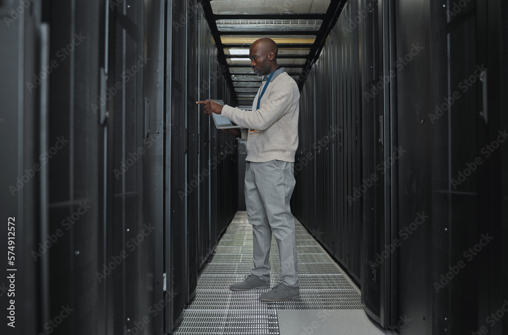 Poster Laptop, maintenance and server room with IT black man for research, engineer working in dark data center. Computer, cybersecurity and analytics with male programmer problem solving or troubleshooting