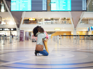 Mother hug child at airport for travel journey, welcome home reunion or goodbye, immigration and international opportunity. Black family mom and girl or kid hugging and sad for flight voyage in lobby