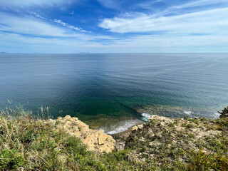 The seabed through the clear water off the coast of the Russian island. Akhlestysheva Bay