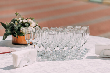 Champagne glasses made up of a triangle are waiting for a holiday 4449.