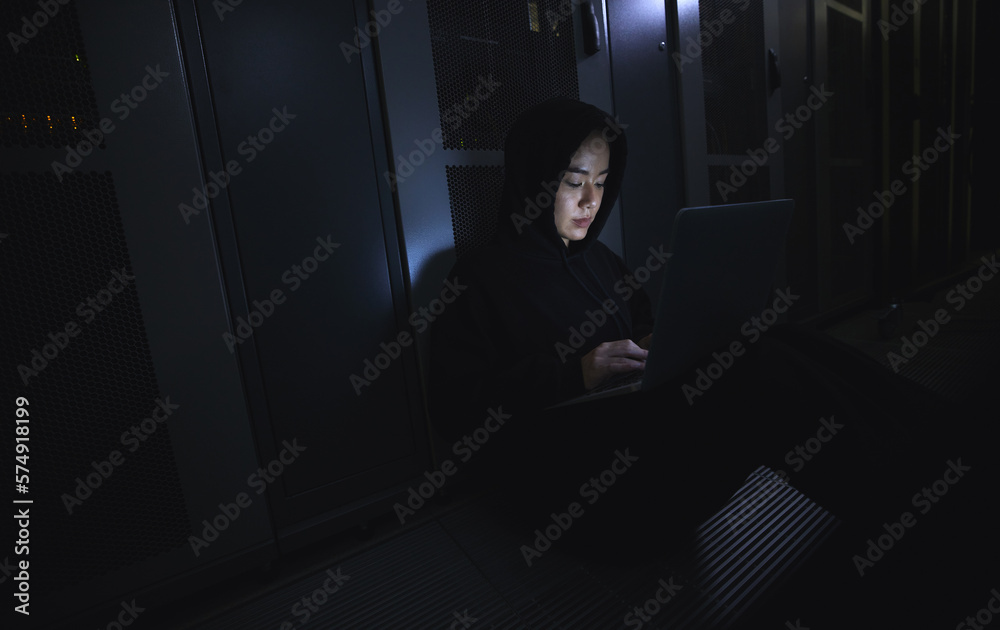 Poster Hacking, laptop and hacker woman in dark server room for coding software, data center crime or cyberpunk intel. Network criminal, person or user in cybersecurity, information technology or ransomware