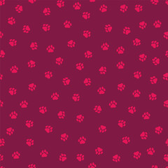 Seamless pattern with pink little paws