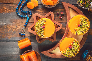 Arabic Cuisine; Dry Apricot Pudding (Qamar Al Deen). Middle Eastern apricot pudding topped with...