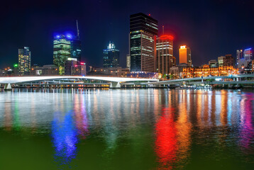 Brisbane night city view with skyscrapers reflections on city river - Australia