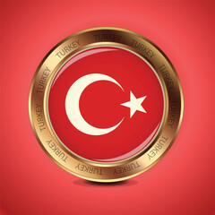 A round gold medal with Turkey's flag on it