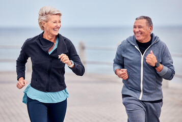 Fototapeta na wymiar Fitness, running and happy senior couple by ocean for exercise, healthy body and wellness in retirement. Sports, marriage and elderly man and woman smile for run, cardio workout and training outdoors