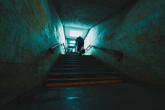 silhouette of the man in underground tunnel