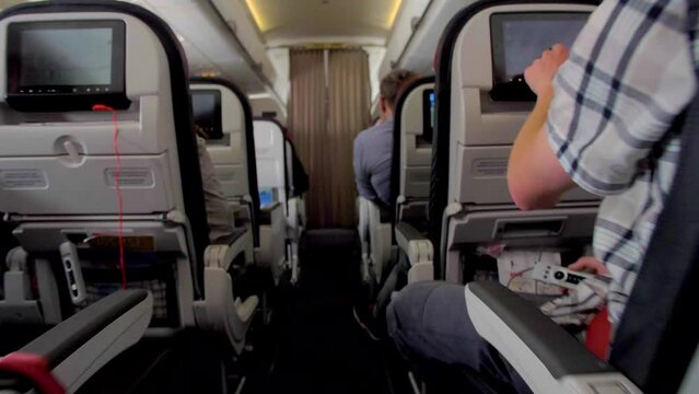 4k airplane passenger cabin gimbal shot airport departures terminal airport airline Flight Passengers