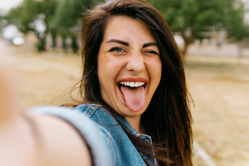 Young hipster woman making selfie - wanderlust vacation on world tour concept