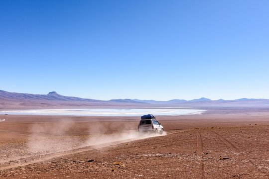 4x4 driving across the desert, Altiplano, Bolivia