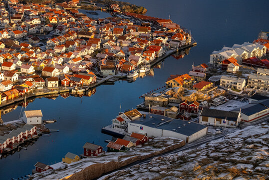 Golden Hour above Smögen: A Breathtaking Aerial View of the Swedish Fishing Village Bathed in the Warm Glow of Sunset