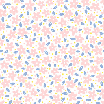Trendy floral seamless pattern. Simple small pink daisies with leaves in vector. Hand-drawn cartoon linocut of cute flowers in pastel colors. Ideal for textiles, fabric, wallpaper.