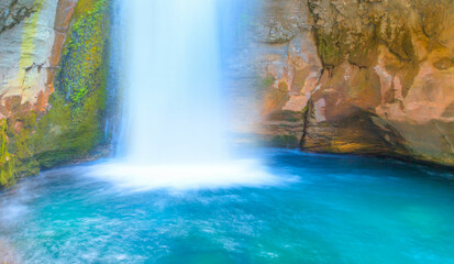 Fototapeta na wymiar Beautiful waterfall of the mountain river with rainbow - Sapadere Canyon, Alanya