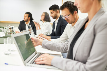 Group of business people is working with laptop computer