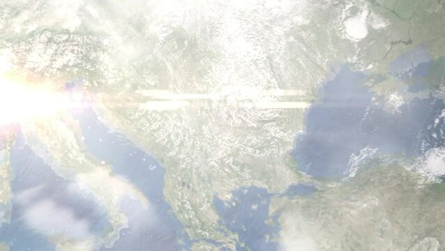 Earth zoom in from outer space to city. Zooming on Lom, Bulgaria. The animation continues by zoom out through clouds and atmosphere into space. Images from NASA