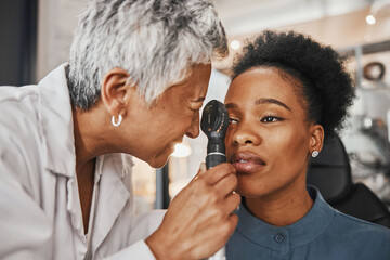 Doctor, vision or black woman in eye exam assessment consultation for eyesight at optometrist...
