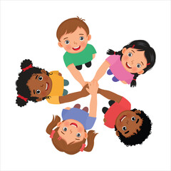Group of happy children putting hands together in unity as a team