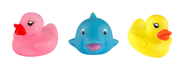 Rubber ducks and blue whale bath toys isolated on white