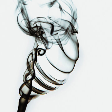 Abstract backdrop with stains of black incense smoke