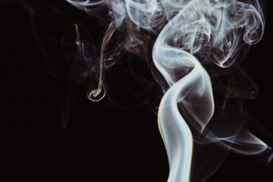 Abstract backdrop with stains of white incense smoke