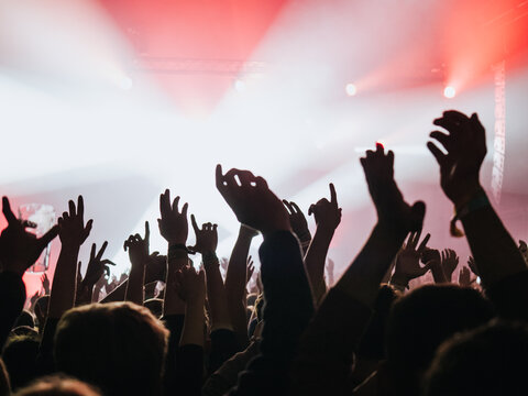 Hands of people on music show