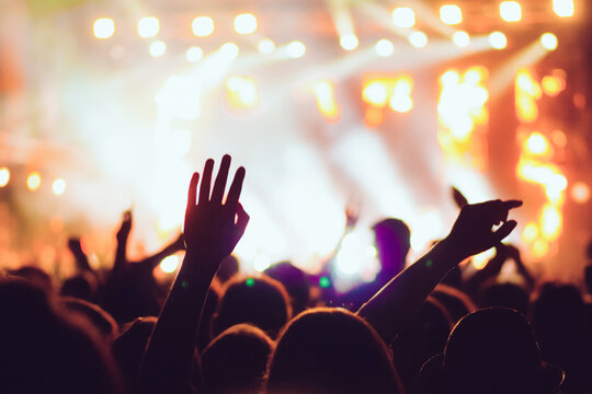 Hands of people on music show