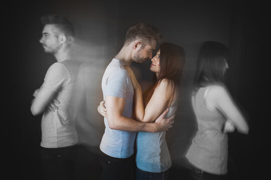 Couple looking at each other and quarreling