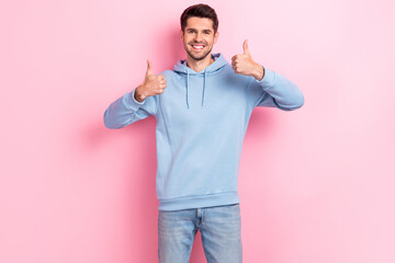 Photo of cheerful glad man wear quality clothes arm thumb up nice feedback proposition offer...