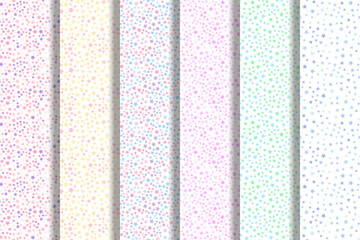 Collection of repeating seamless patterns of pastel multicolored stars for printing on various surfaces such as postcards, placards, fabric, papers, dishes etc