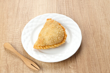 Jalangkote, Indonesian traditional snack filled with egg, carrot, potato, rice noodles. Served with chili sauce
