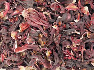 Dry hibiscus flowers as background