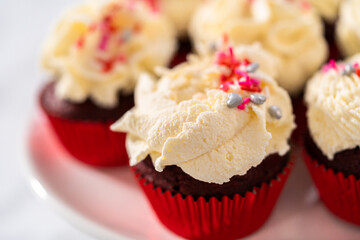 Red Velvet Cupcakes with White Chocolate Ganache Frosting