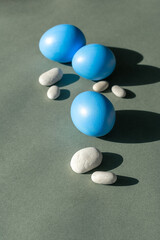 Easter blue eggs on a gray background