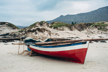 Fototapeta na wymiar Old boat on beach