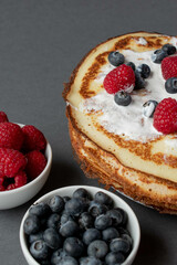 Fresh baked french pancakes with berries