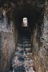 Ancient stairs in dungeon tunnel in Doria Castle in Porto Venere, Italy