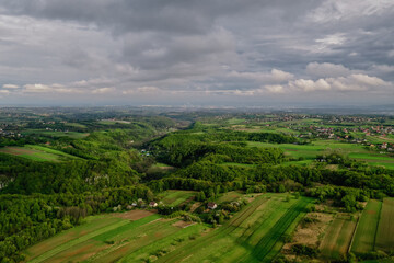 Fototapeta na wymiar Aerial shot of Ojcow National Park south part, aerial view of green Pradnik valley, Lesser Poland, Europe, late spring, 2020