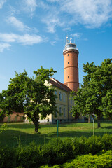 Baltic Sea lighthouse in Jaroslawiec, small coastal village in Poland - 575006123