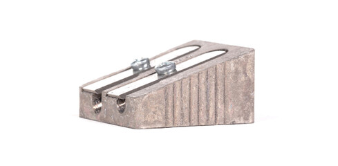 Old manual metal pencil sharpner on white background