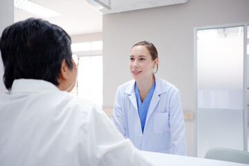 female doctor with female patient medical concept