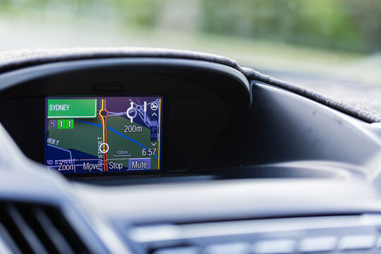 Navigation panel on car driving in NSW towards Sydney