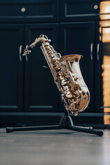 Closeup photo of a gold saxophone woodwind instrument