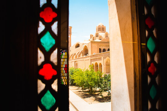Hammam Soltan Amir Ahmad the roof and the architecture. Tabatabaei Historical House in Kashan, Iran. Wonderful view of traditional colorful Iranian stained glass windows.
